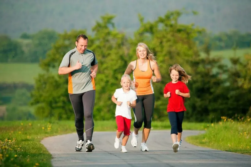 Family jogging outdoors